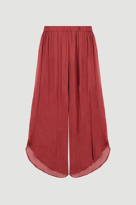 Terakotowe spodnie o asymetrycznym kroju Solar Obraz 4