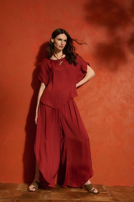 Terakotowe spodnie o asymetrycznym kroju Solar Obraz 1