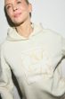 Beżowa bluza z autorską aplikacją Solar Obraz 4