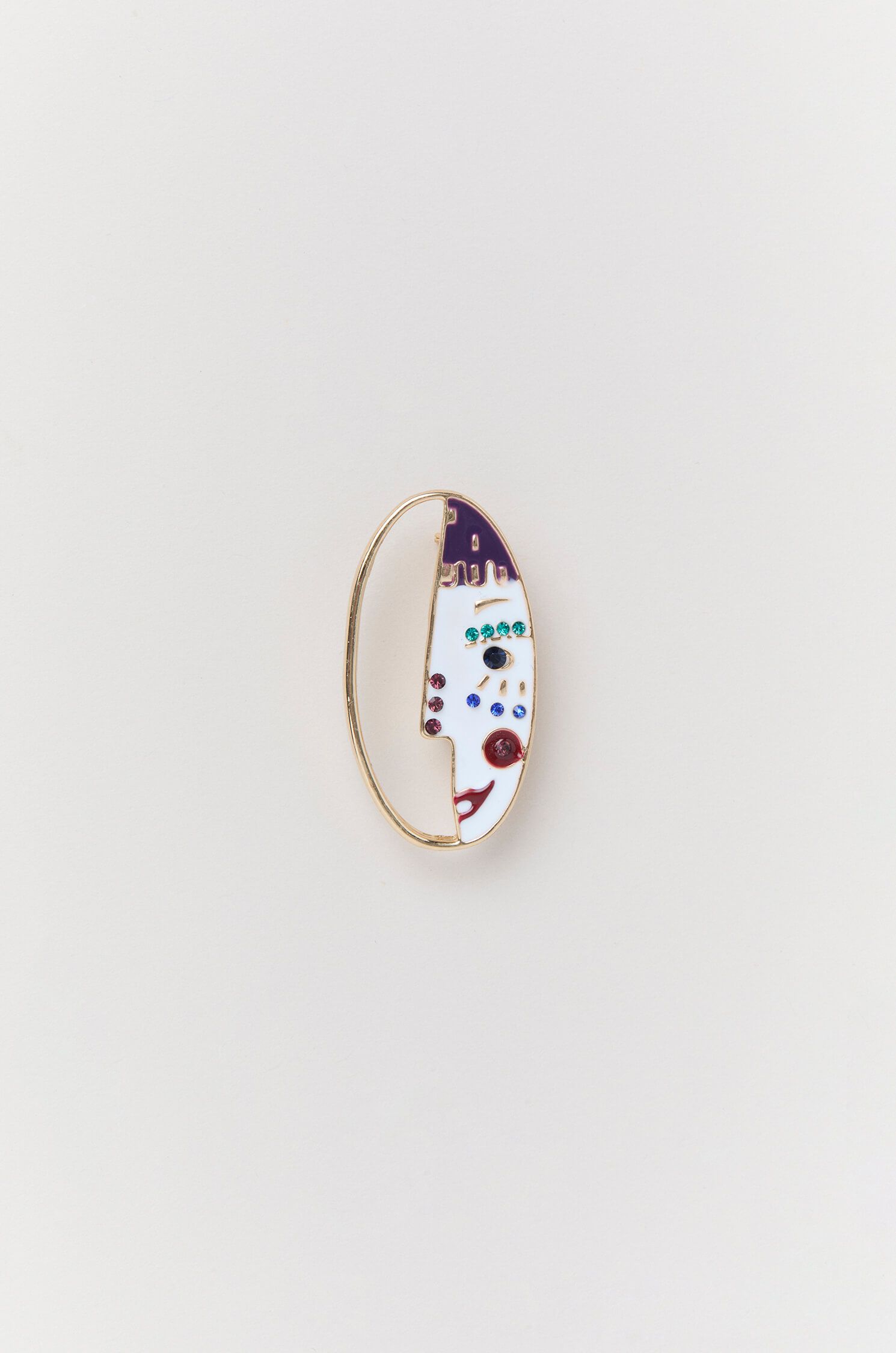 Owalna broszka z motywem twarzy Solar Obraz 1