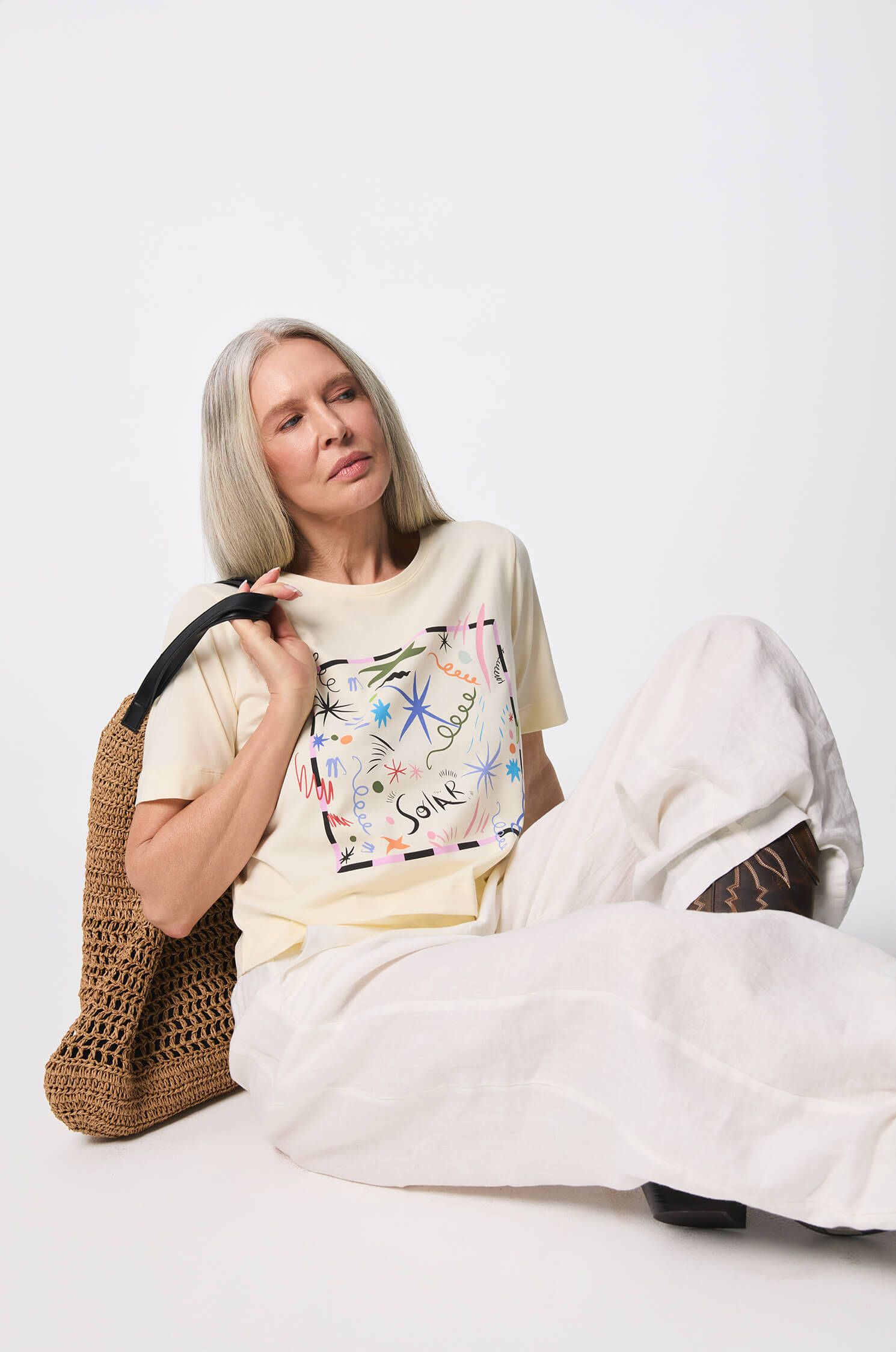 Jasnożółta bluzka z autorskim printem Solar Obraz 1