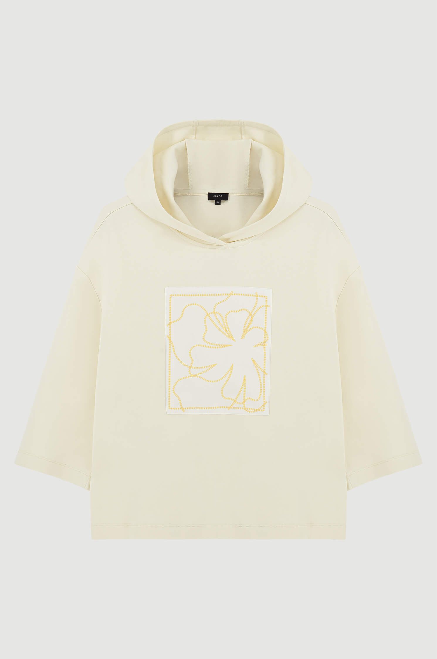 Beżowa bluza z autorską aplikacją Solar Obraz 5
