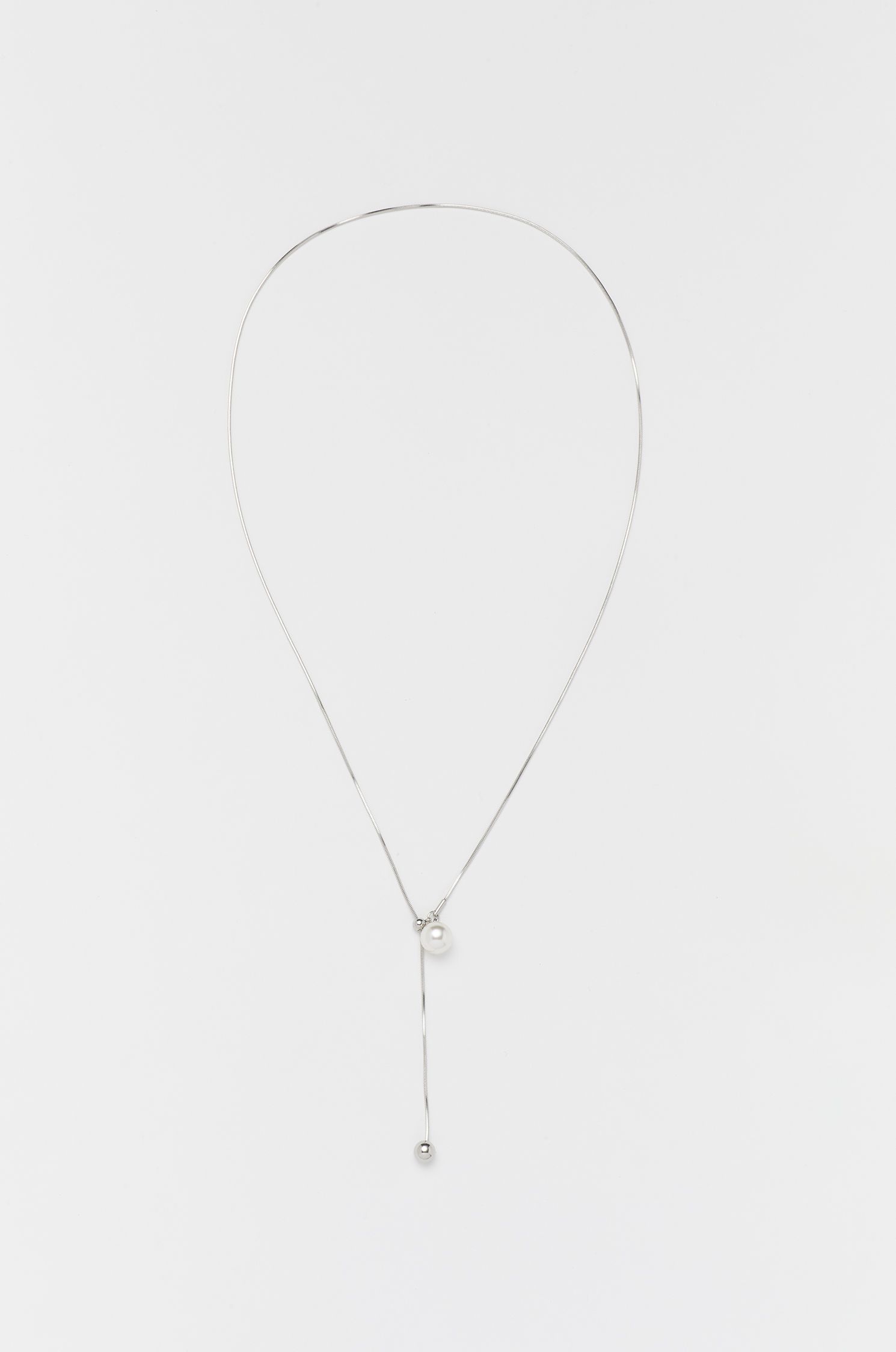 Srebrny naszyjnik z perłową zawieszką Solar Obraz 1