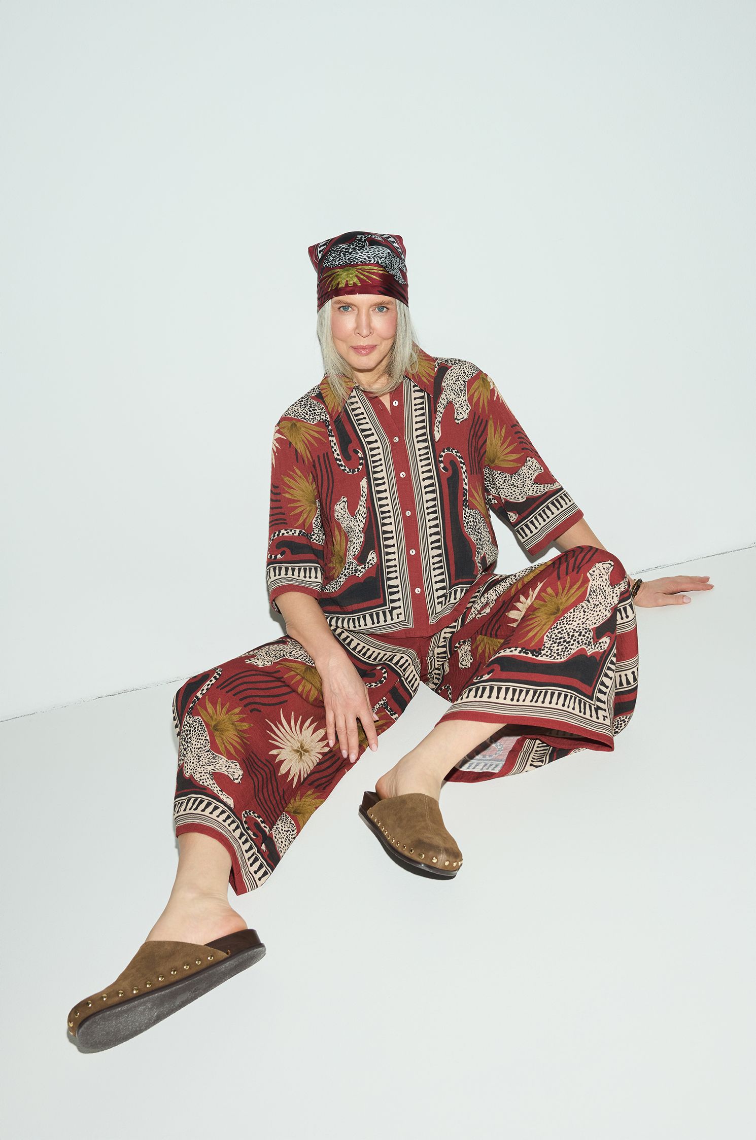 Terakotowe spodnie wide leg z printem Solar Obraz 3